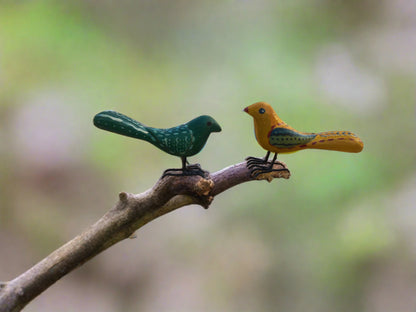 Wooden Chirping birds with iron legs are excellent gifting options for garden lovers. Place them randomly on your plants to replicate more closely to nature. 