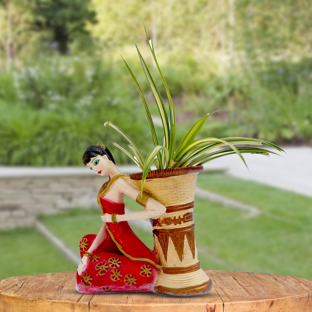 The Planter Girl, the perfect addition to your indoor or outdoor garden. This girl planter adds a touch of whimsy and charm, enhancing any plant it holds. Handcrafted with care, it is a unique and delightful way to showcase your greenery. Experience the joy of gardening with EVA-The Planter Girl.