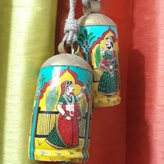 Bring a touch of playful charm to your home with our Mughal bell set! This set of 2 intricately designed bells adds a unique touch to any room or garden. With their exquisite details and delightful sounds, these bells are sure to bring joy and whimsy to any space. Let the Mughal magic ring throughout your home!