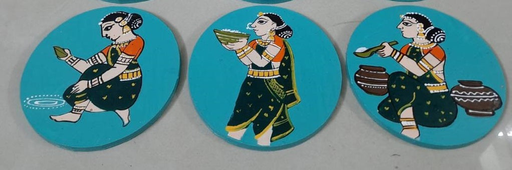 Wooden coasters with stand inspired from Indian dance forms. A handcrafted masterpiece which will add color to your space definitely live up to your desired artwork expectations. Fill your dining ;side tables;garden tables etc decor with this artwork . Excellent product for gifting on any occasions.